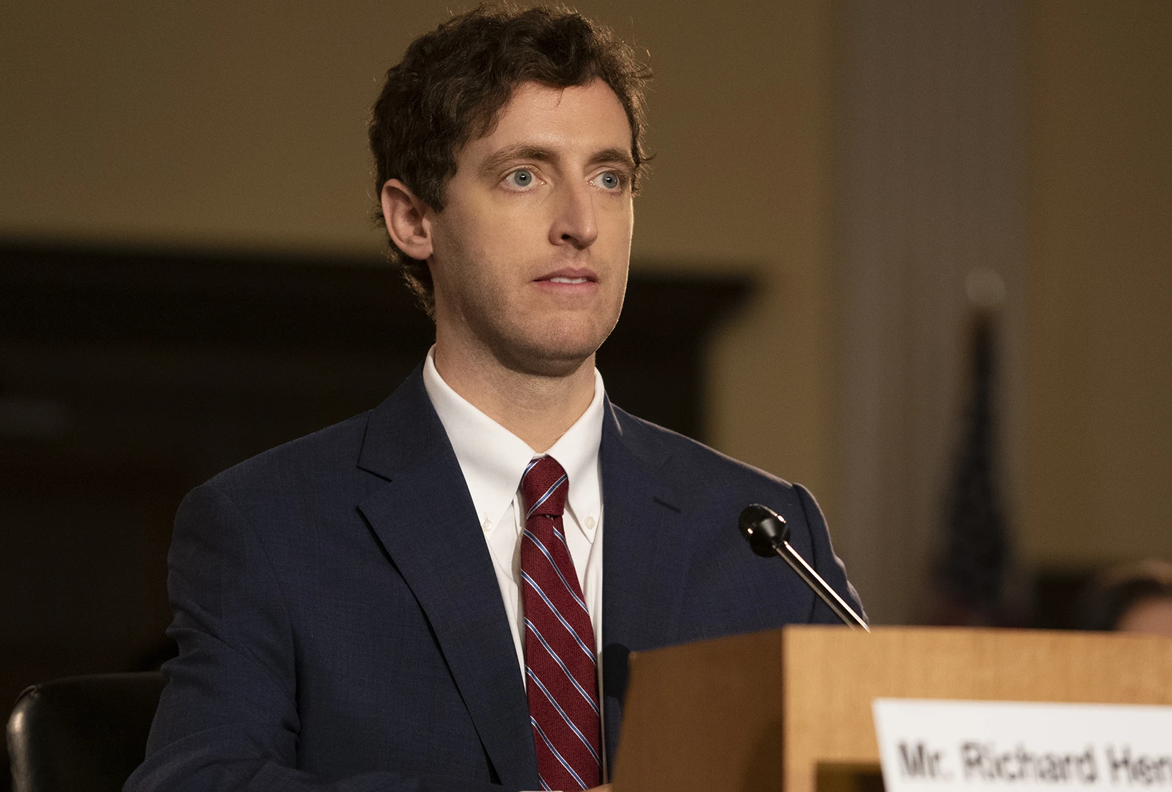 Richard Hendricks, played by Thomas Middleditch, testifying at a congressional hearing in HBO's Silicon Valley